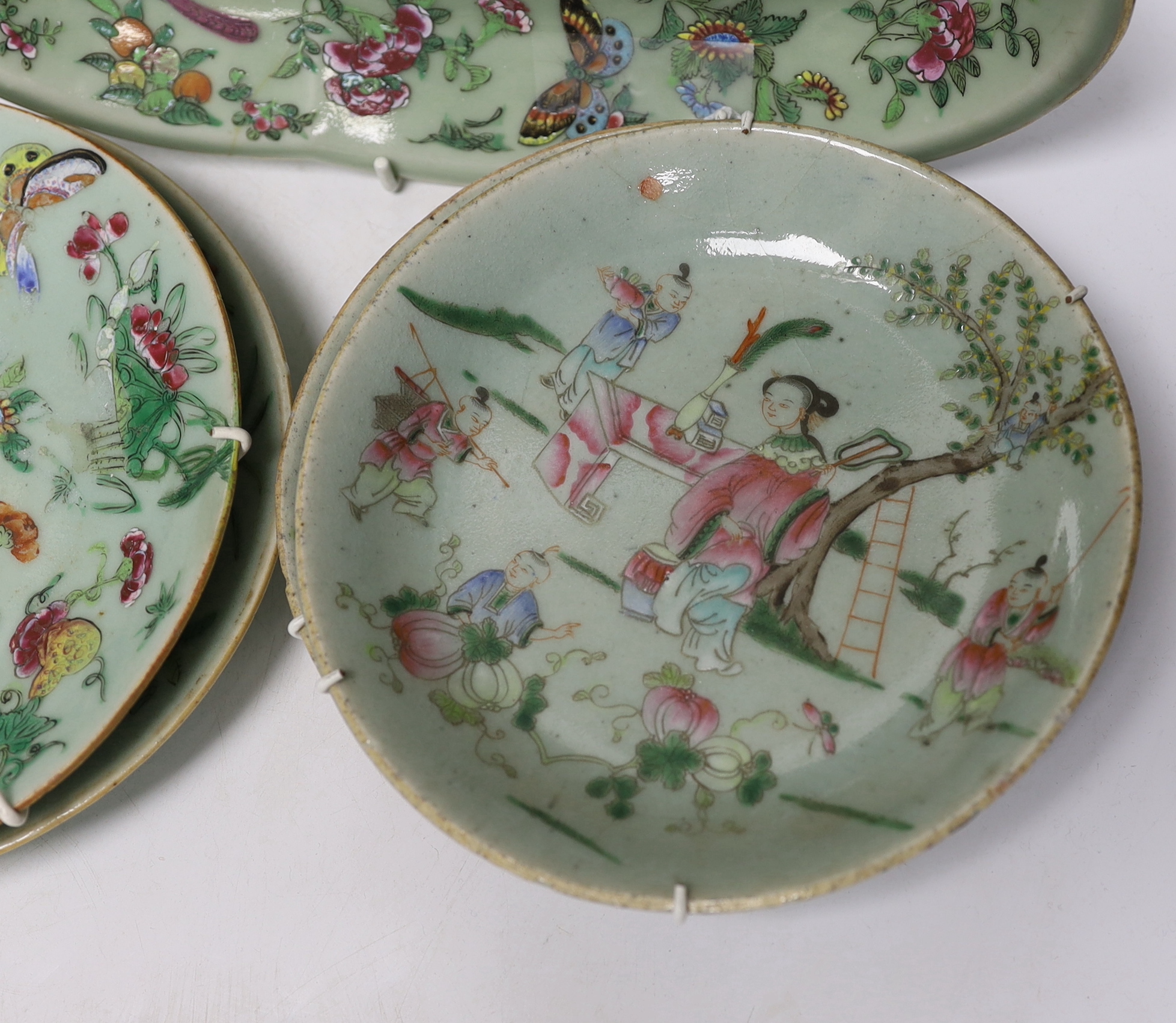 Eight 19th century Chinese celadon glazed famille rose dishes, largest 26cm